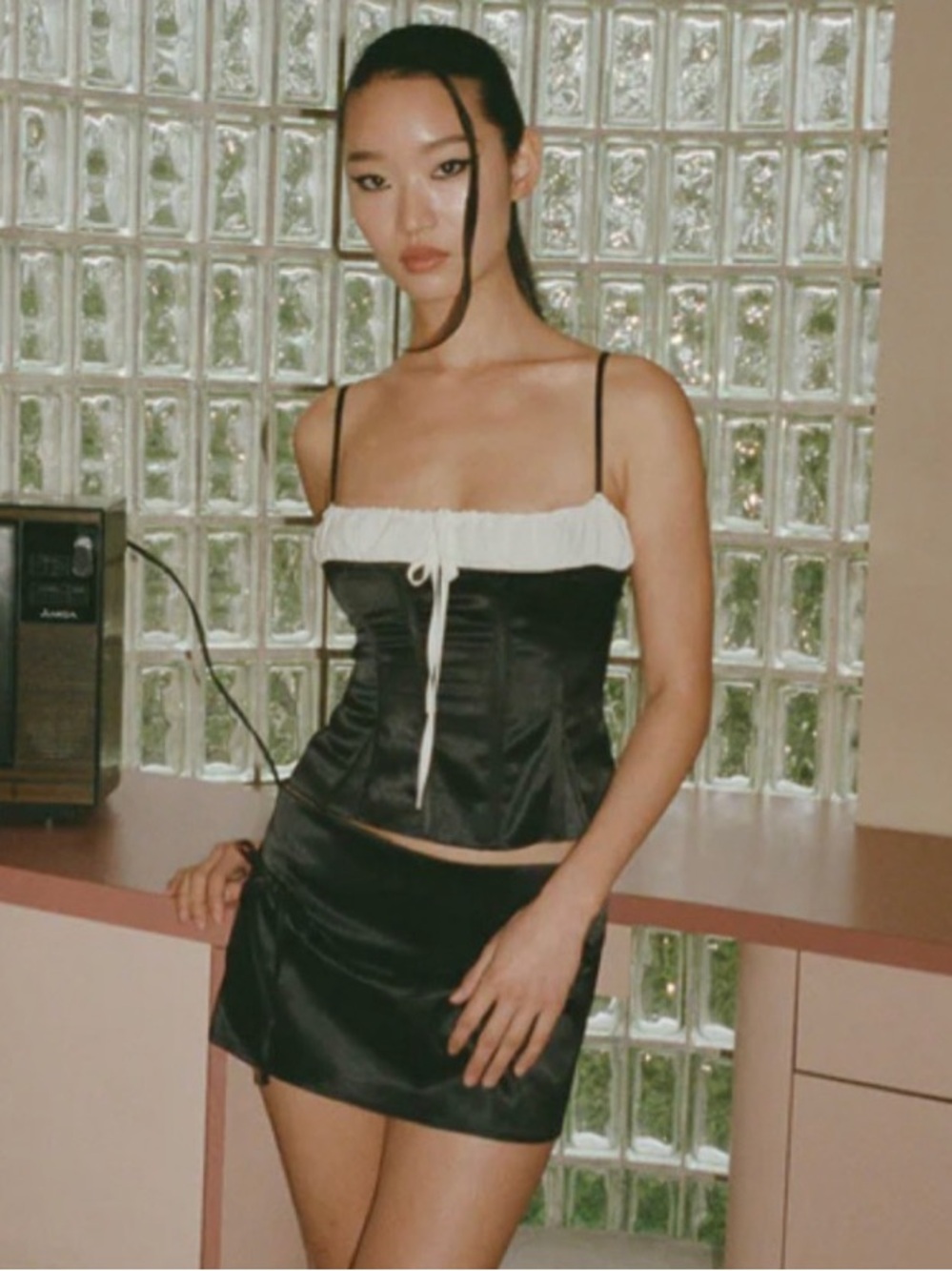 With Jean Serena mini skirt in black